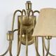 Wall sconce with nine arms in brass, France, circa 1950.