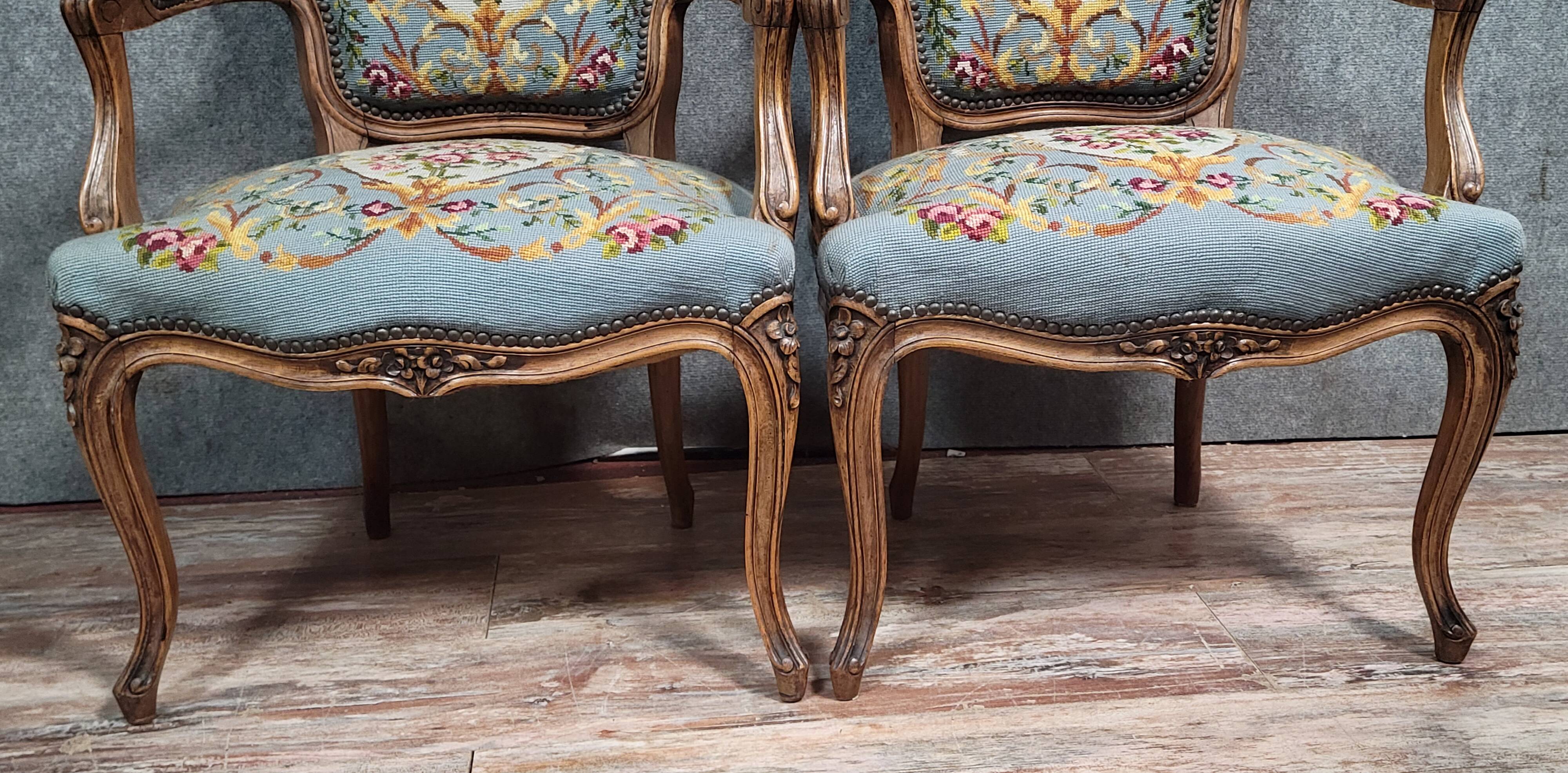 Pair of Louis XV style cabriolet armchairs in walnut