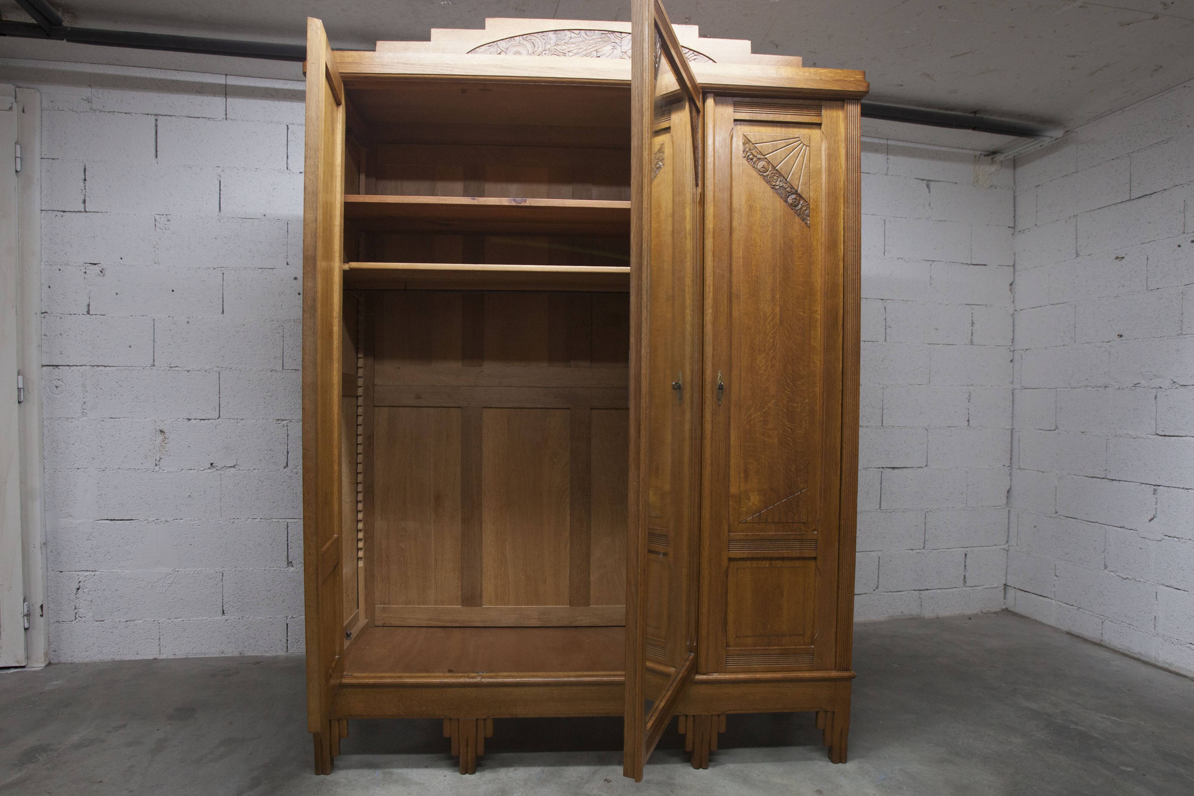 Art Deco carved oak wardrobe - Flemish workshop circa 1930