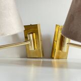 articulated brass and velvet wall light