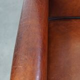 Vintage set of 4 sheepskin leather dining chairs on castors