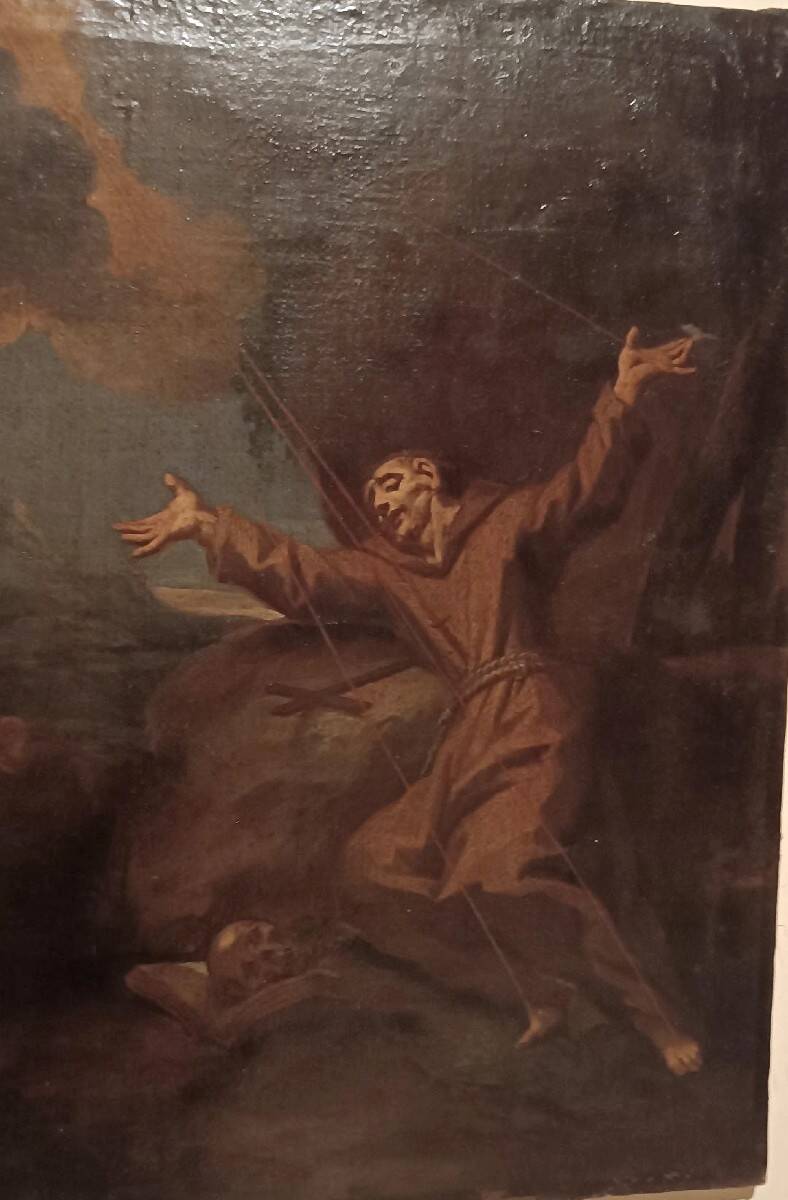 Old oil painting on canvas depicting Saint Francis in ecstasy