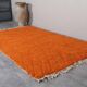 Handmade traditional natural wool rug in orange, size 1.5/2.5 m.