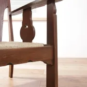 Pair of low Brutalist oak lounge chairs with new rush seats – circa 1935