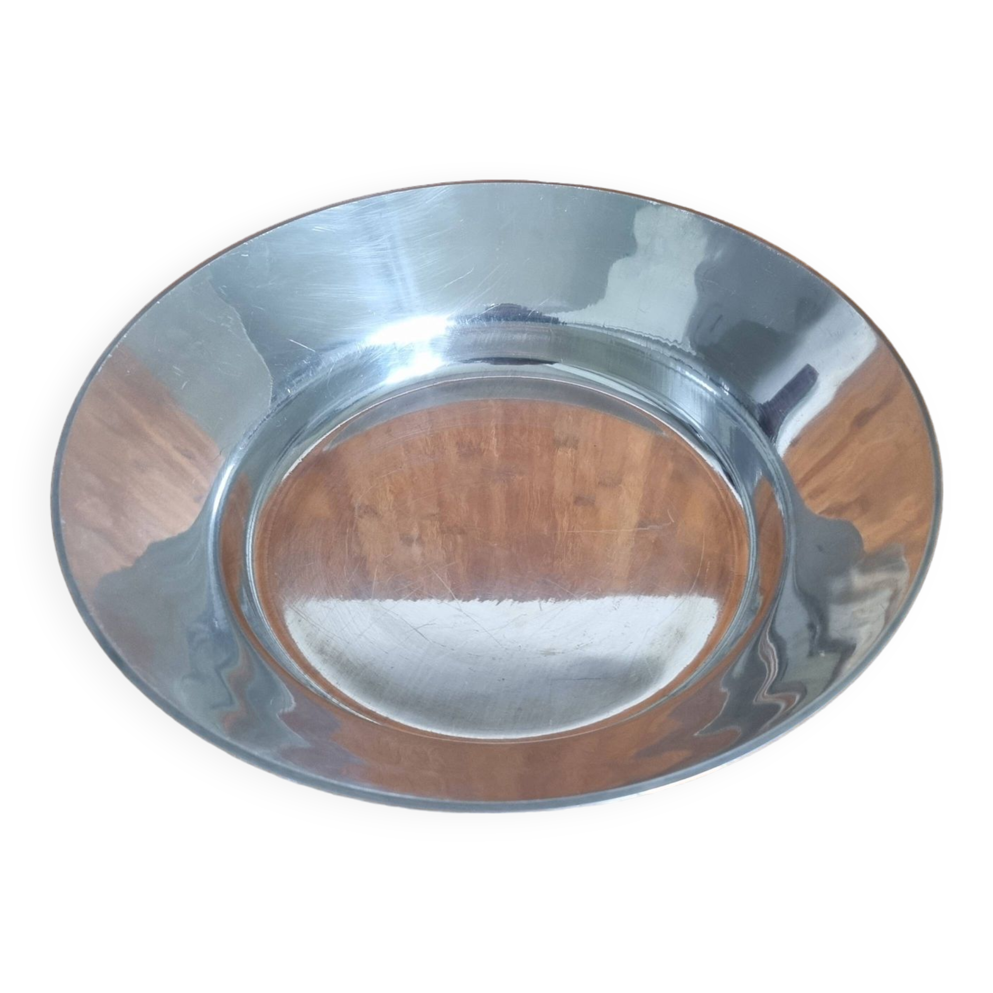 Large round hollow metal dish