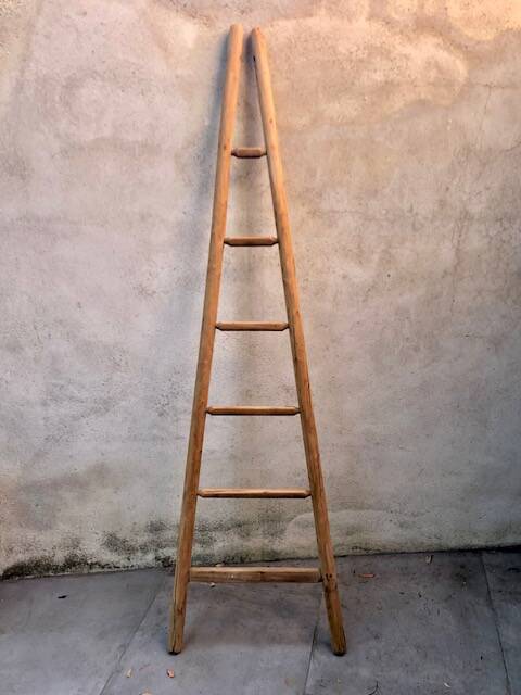Wooden triangular ladder