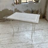 Perforated garden dining table