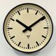 Grey industrial factory wall clock from pragotron, 1960s