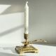 Patterned solid bronze hand candle holder