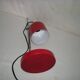 Sliding red desk lamp from the 1970s.