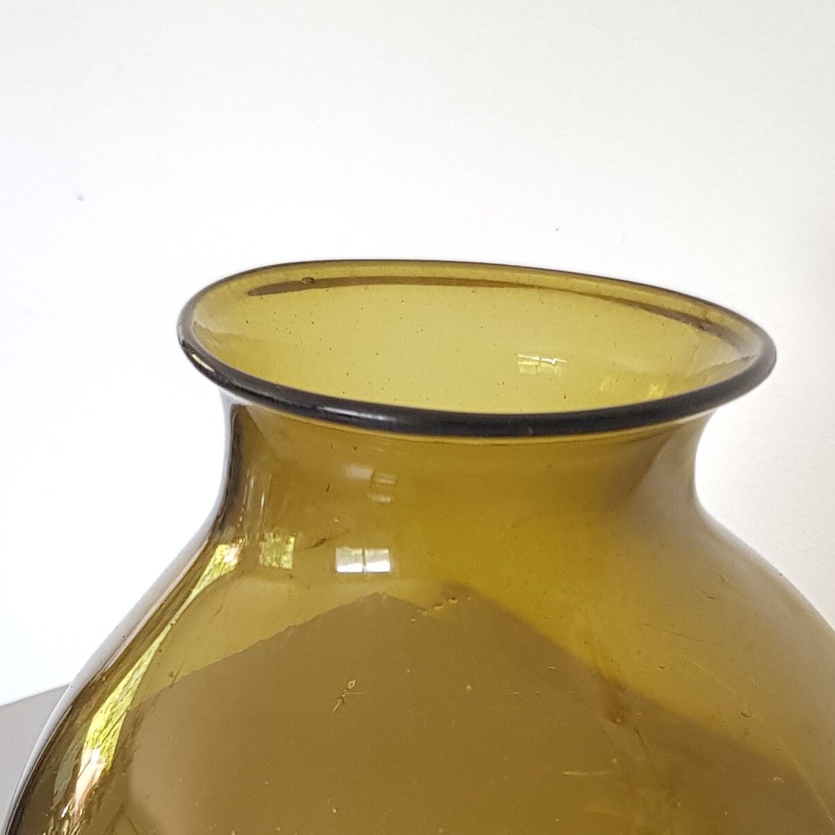 Amber green brown ball vase