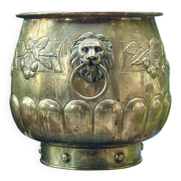 Large brass lion planter with a hallmark from the 19th century.