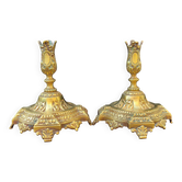 Pair of antique carved bronze candlesticks.