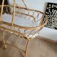 Rattan bassinet with support