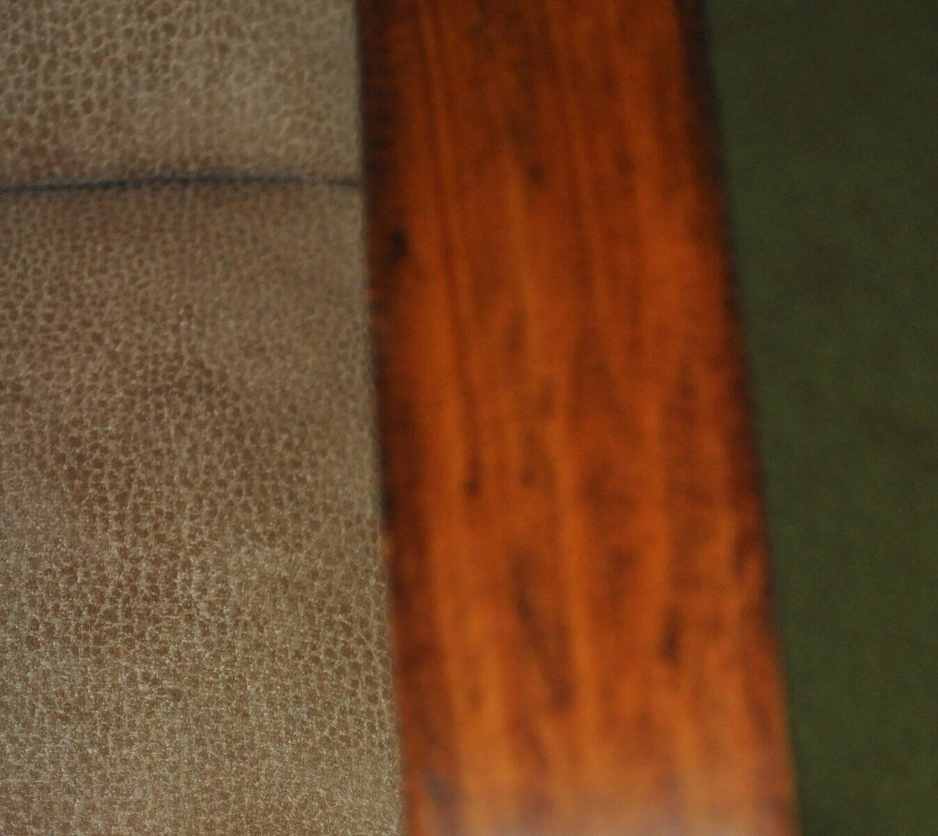 Pair of Cesky Nabytek armchairs from the 1950s in brown leather with a wooden structure in Mid-Century style.