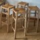 Set of 4 vintage high bar stools in raw solid oak and straw.