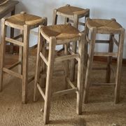 Set of 4 vintage high bar stools in raw solid oak and straw.