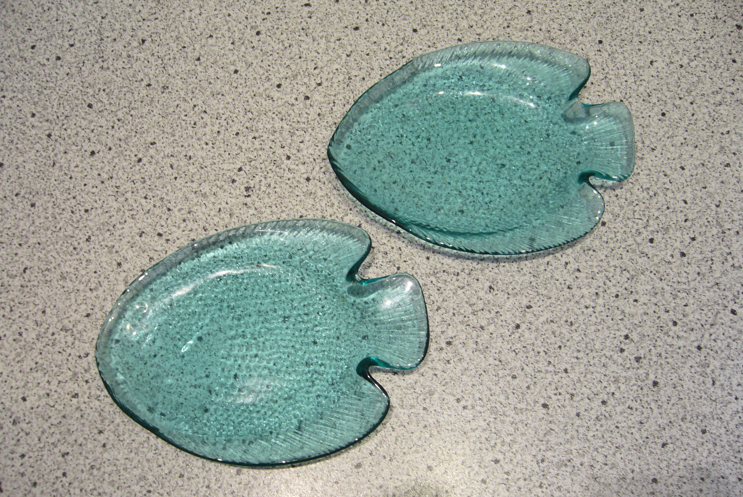 Two fish-shaped bowls
