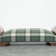 Antique daybed reupholstered with sheepskin and Scottish tartan wool