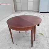 Half-moon table with extensions