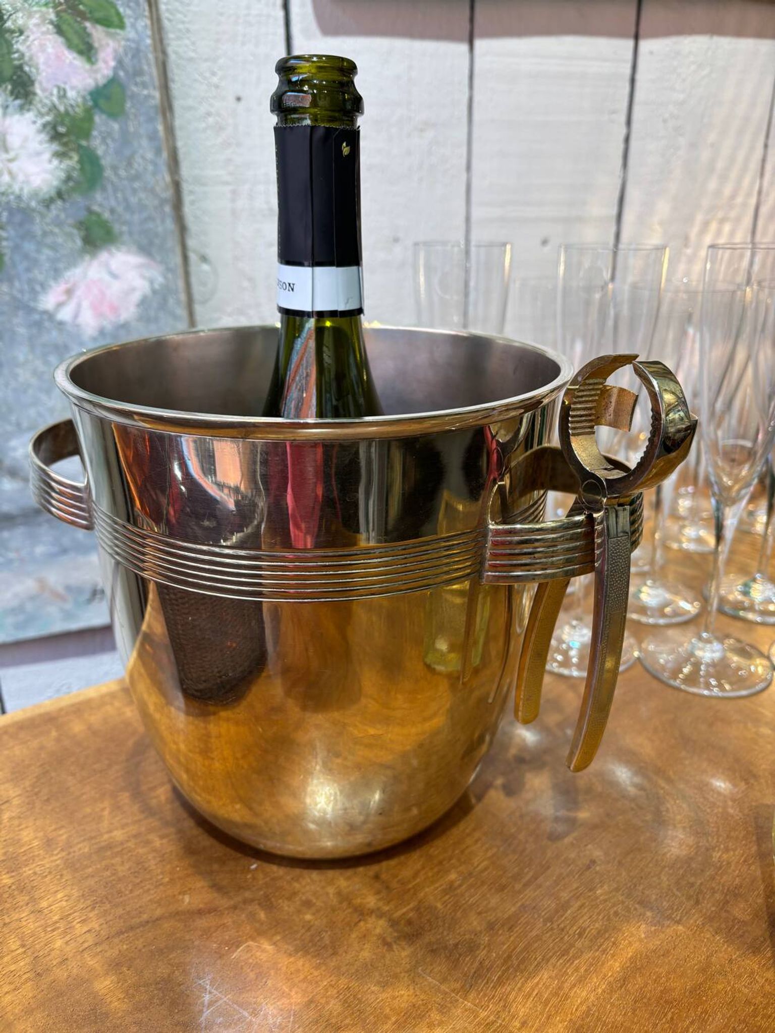 Alpaca champagne bucket from the 1920s with its monopole tongs.