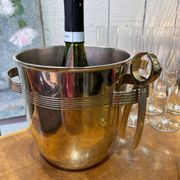 Alpaca champagne bucket from the 1920s with its monopole tongs.