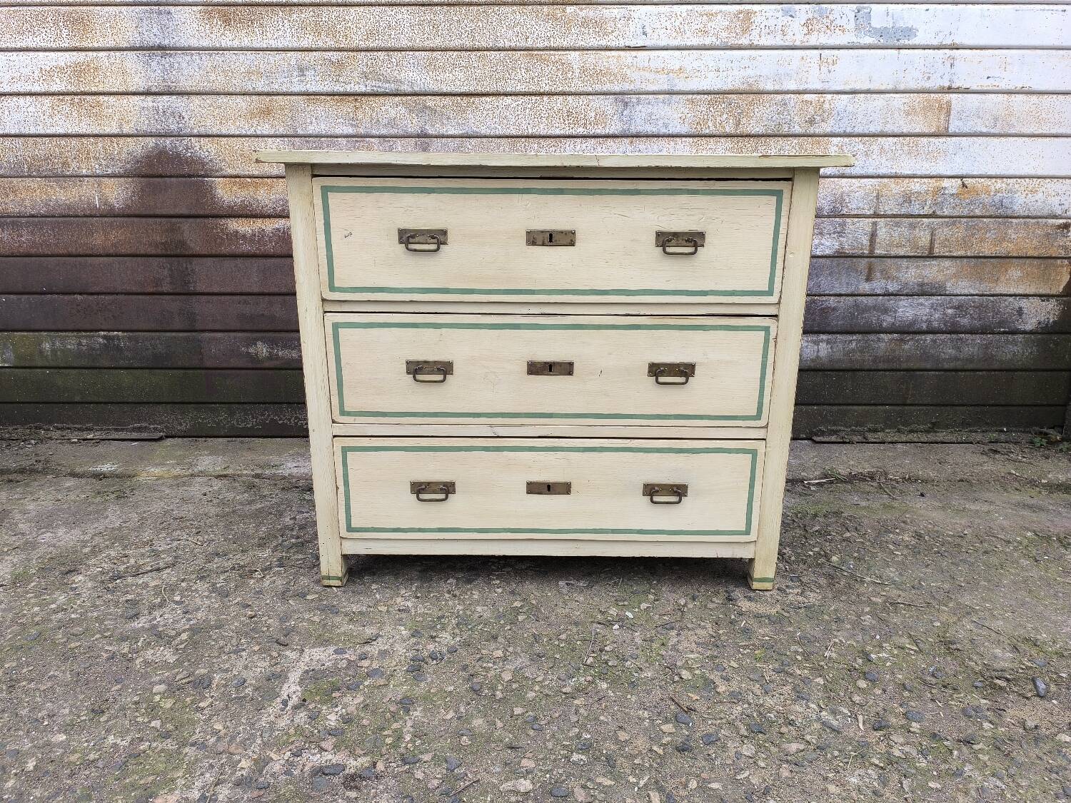 4-drawer chest of drawers with yellow and green patina by a local artist