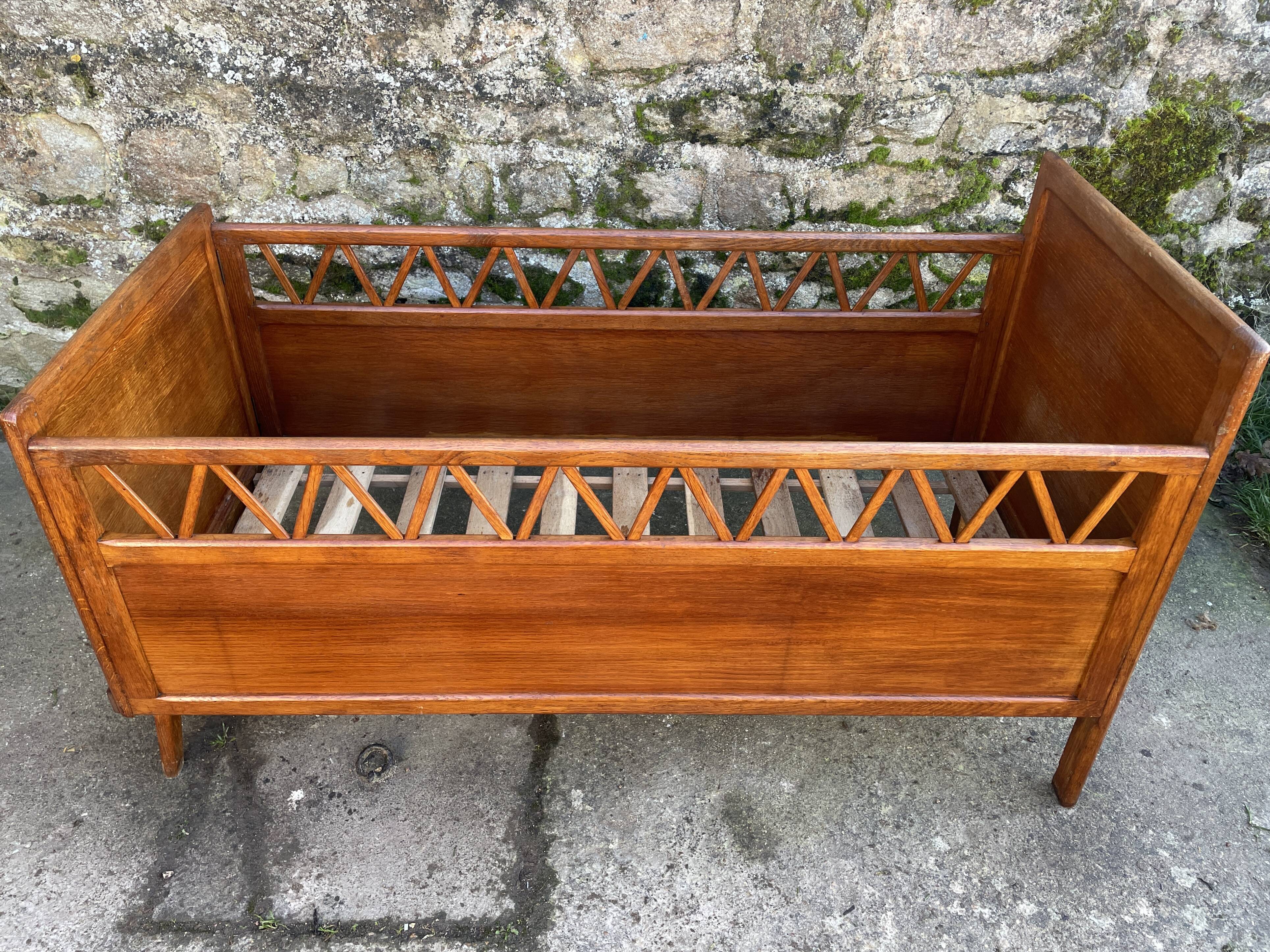 Handmade children's bed with compass feet 1950