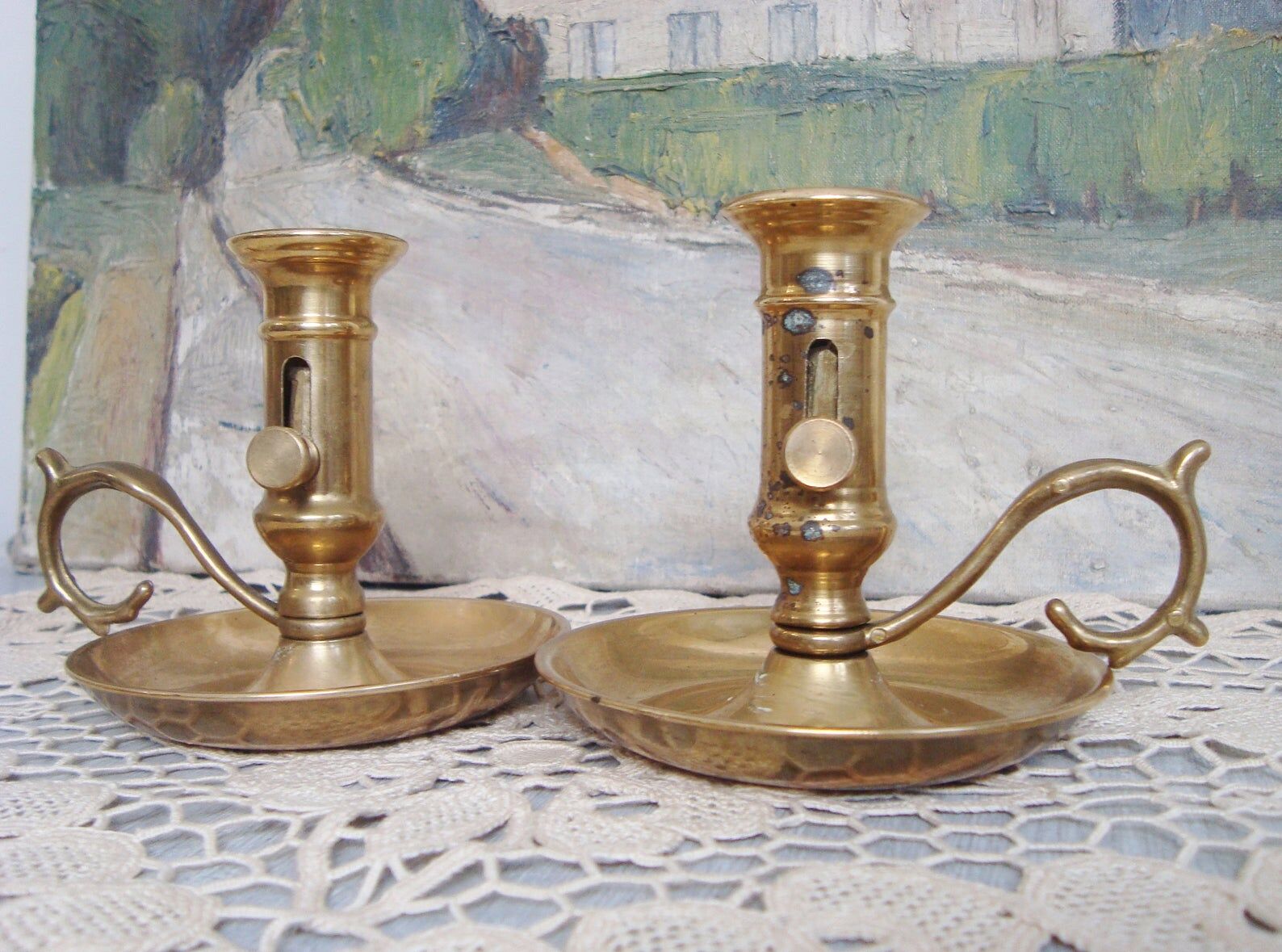 Pair of brass cellar rat candlesticks
