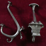 Pair of silver metal hooks