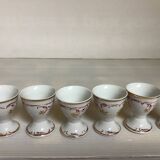 Six hand-decorated and signed egg cups