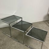 Nesting table in chrome metal and smoked glass 1980