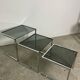Nesting table in chrome metal and smoked glass 1980