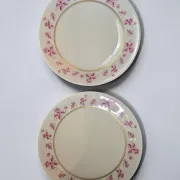 4 flat plates in fine Limoges porcelain from the Raynaud house.