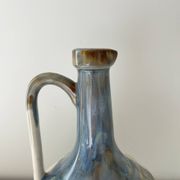 Cherry-decorated earthenware carafe