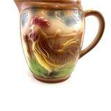 Slush pitcher with rooster decor