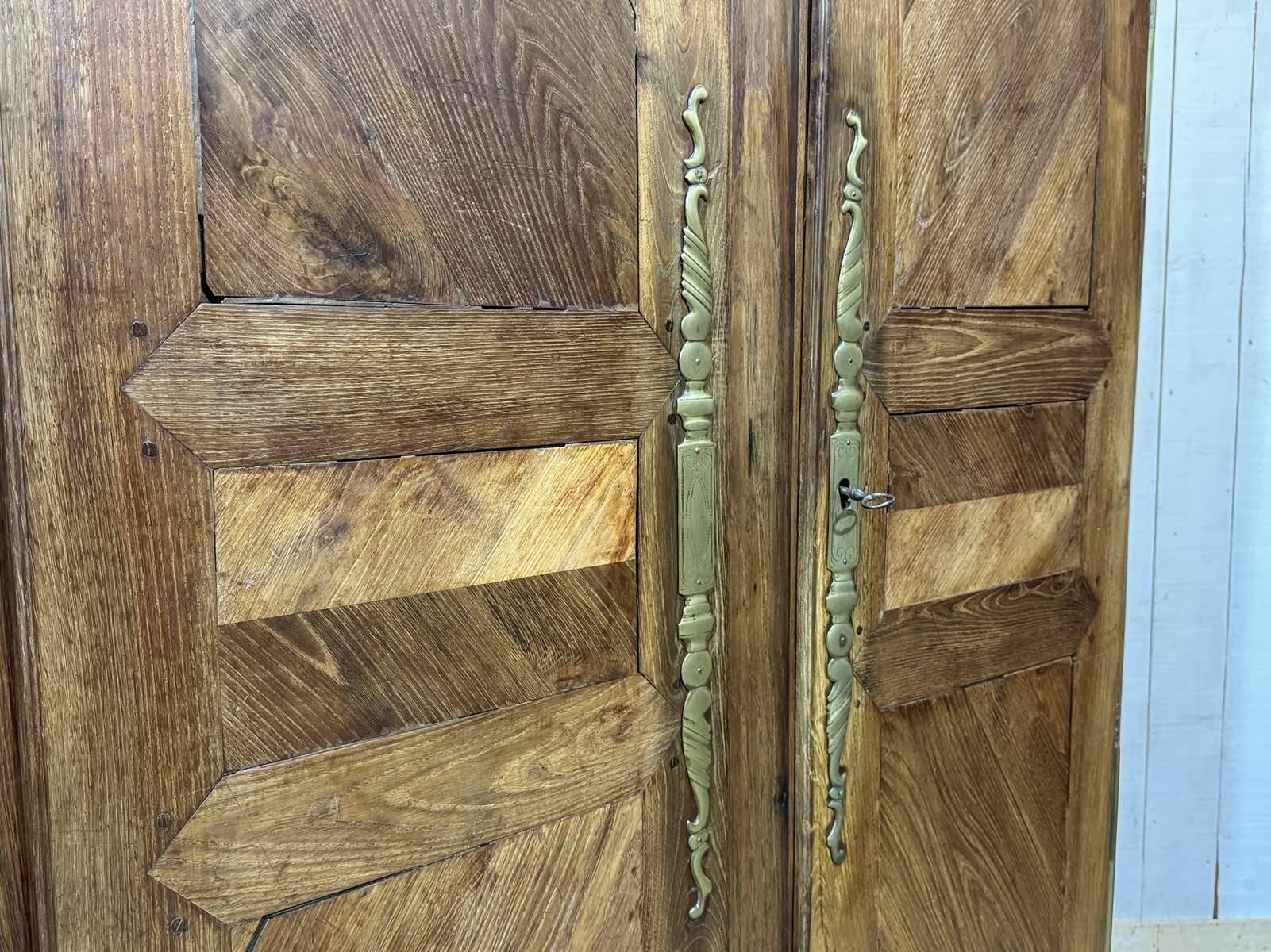 19th-century Breton wardrobe in oak and chestnut.