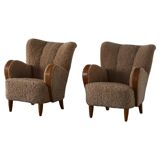 Pair of Danish Art Deco modern lounge chairs in sheepskin with lambswool and elm, 1940s.