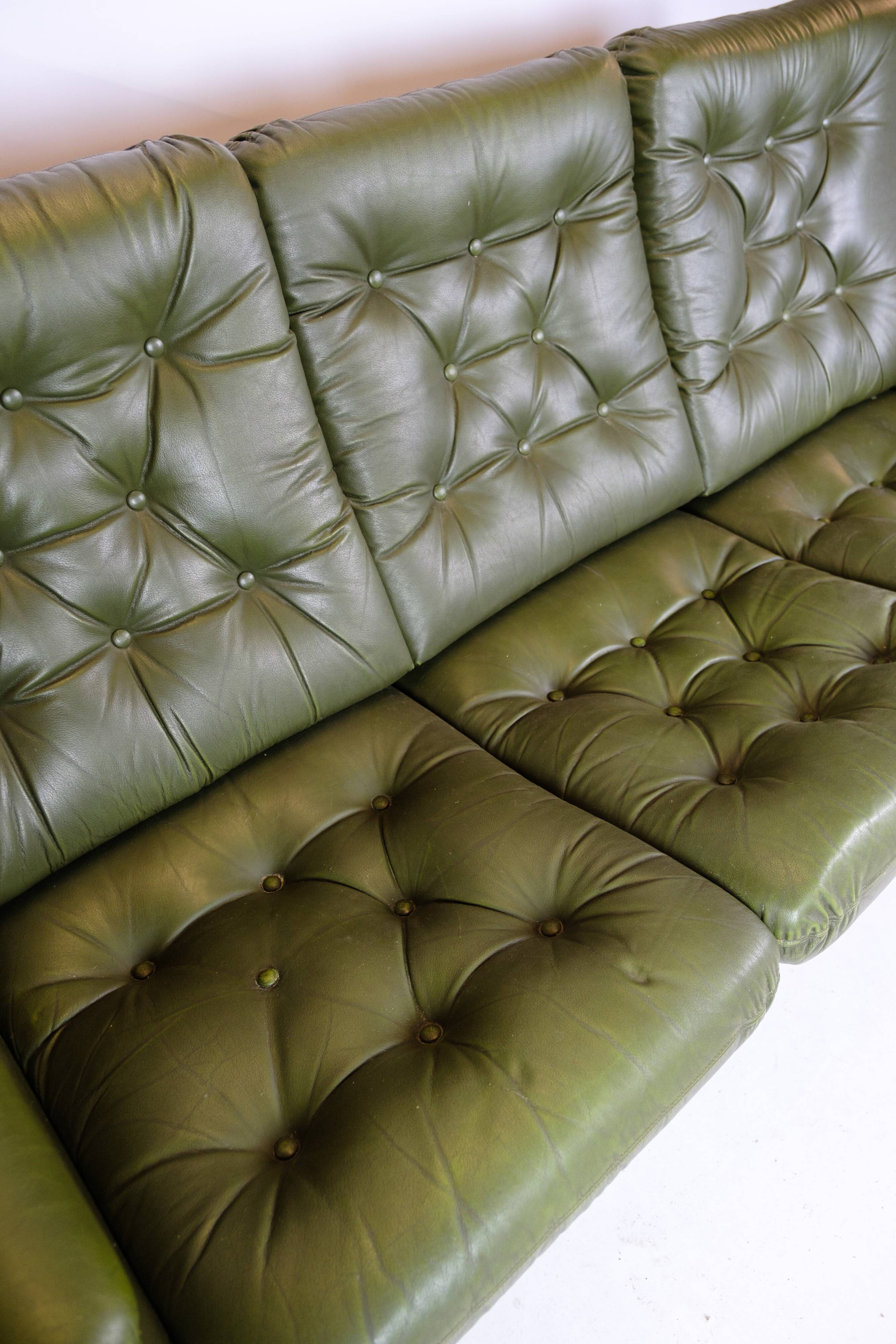3 pers. sofa in dark green leather with chrome legs from 1970s