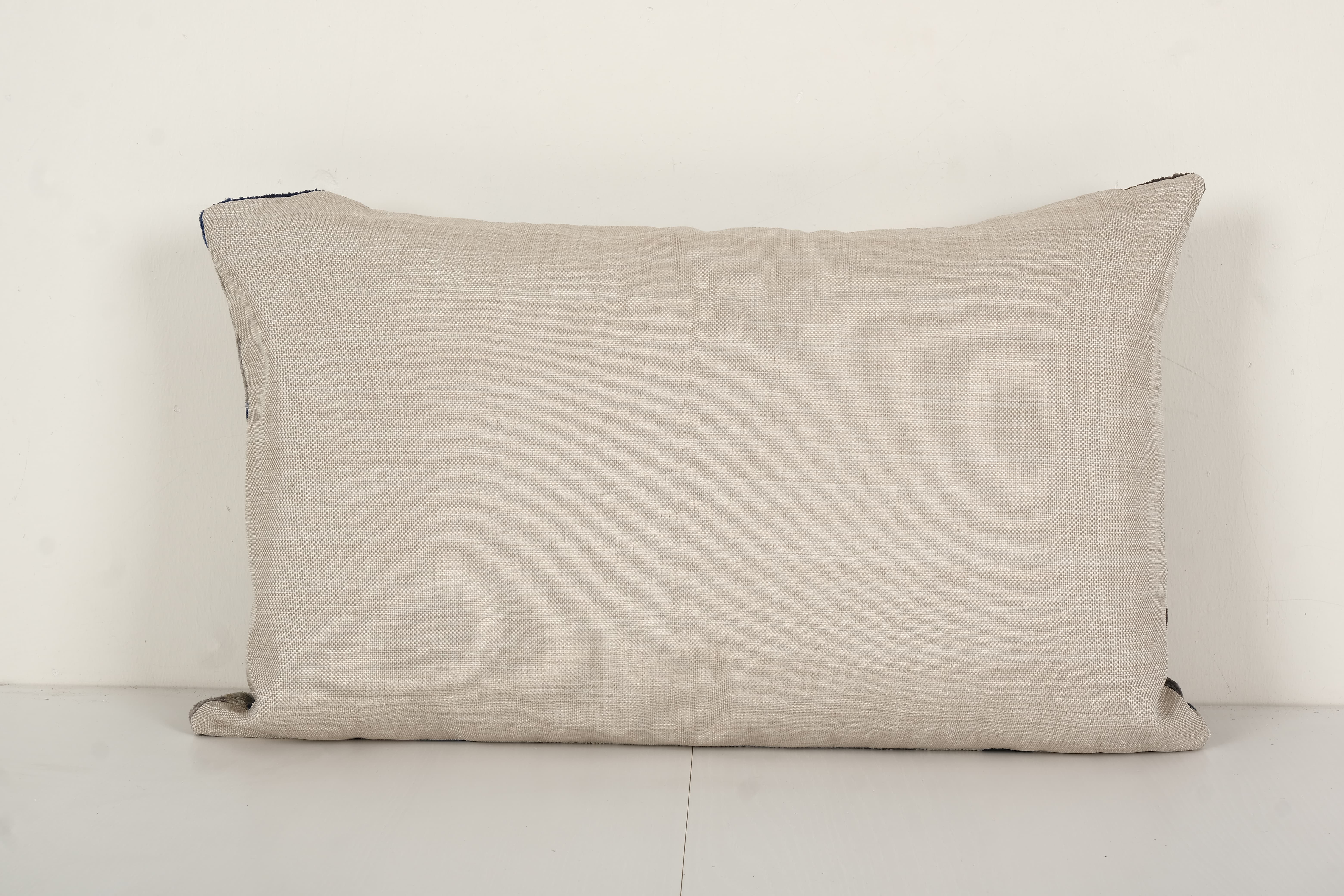 Geometric ikat velvet lumbar pillow