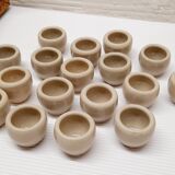 Set of 17 buckets sandstone snails