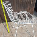 Chairs and footrest by Harry Bertoia
