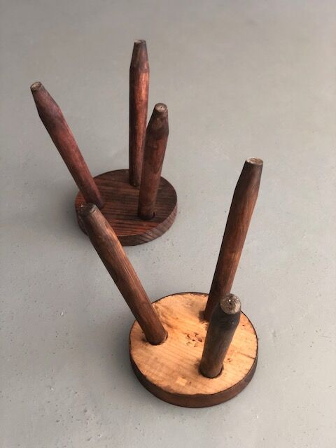 Pair of dyed wooden milking stools