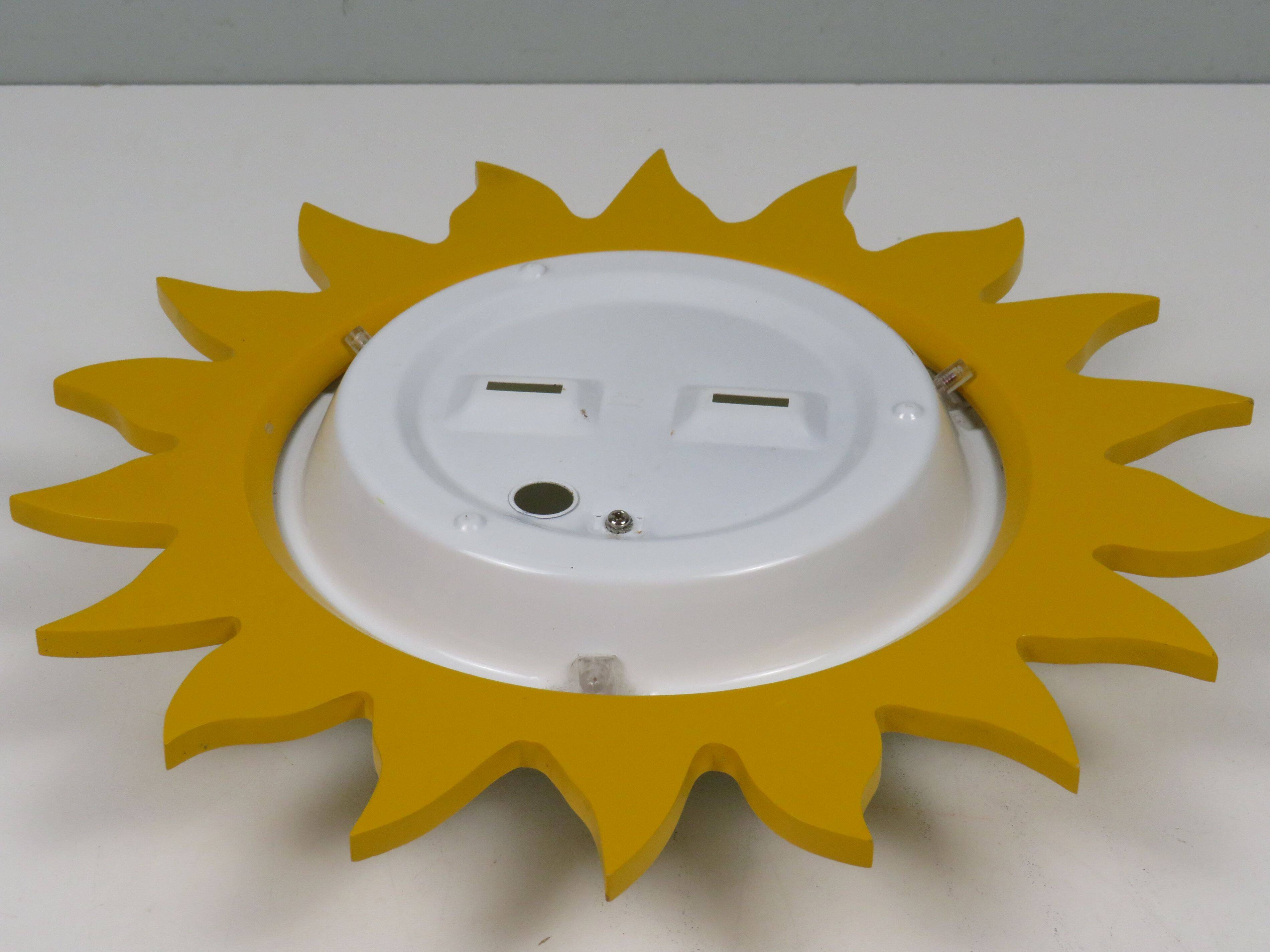 Vintage "sun" ceiling light Massive Belgium in opaline glass and lacquered wood.