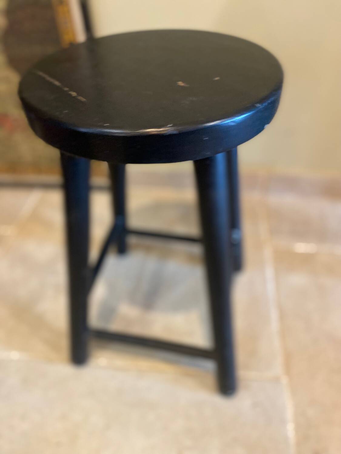 Black wooden stool