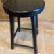 Black wooden stool