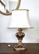 Florentine lamp in carved wood, gold leaf, silk shade.