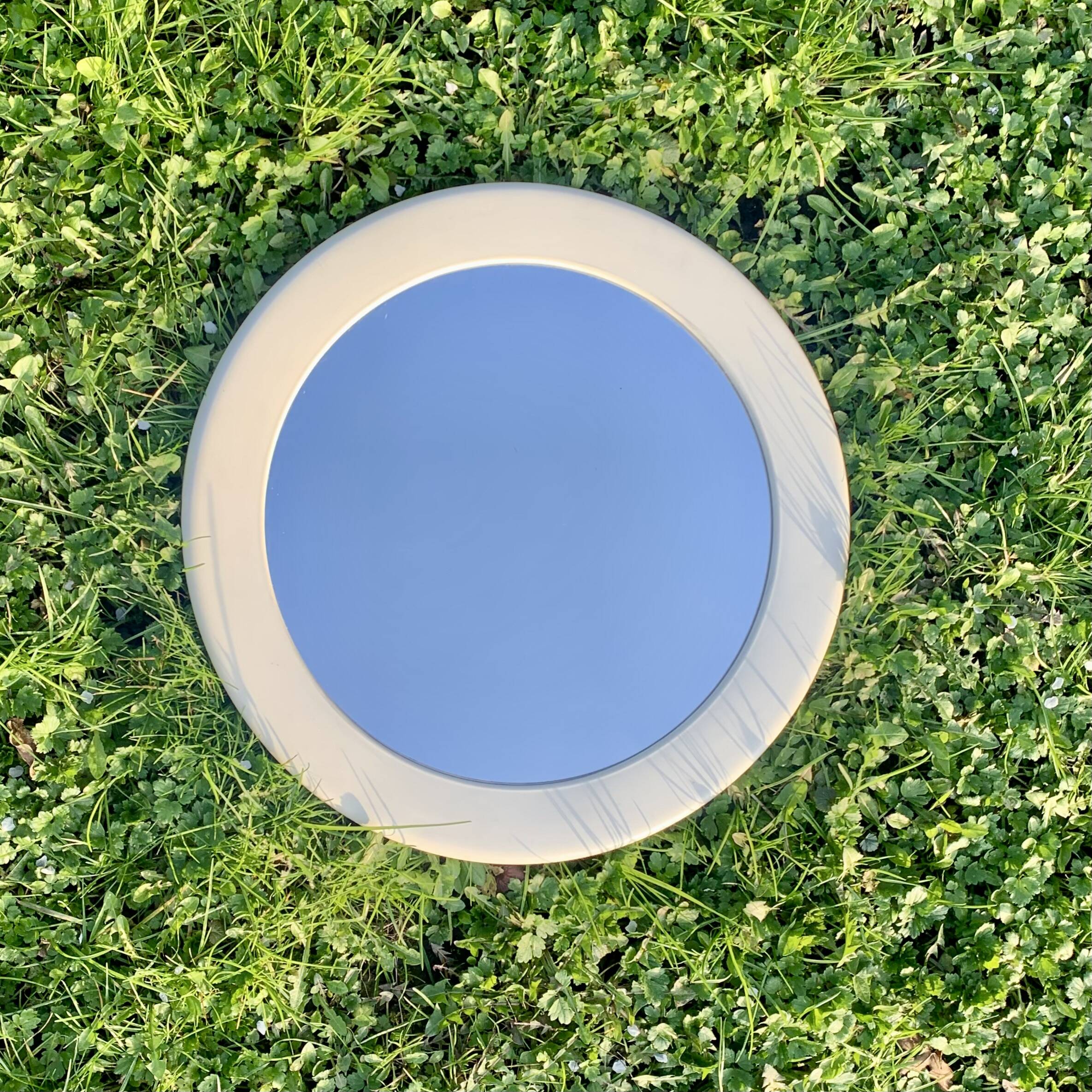 Vintage round white plastic mirror