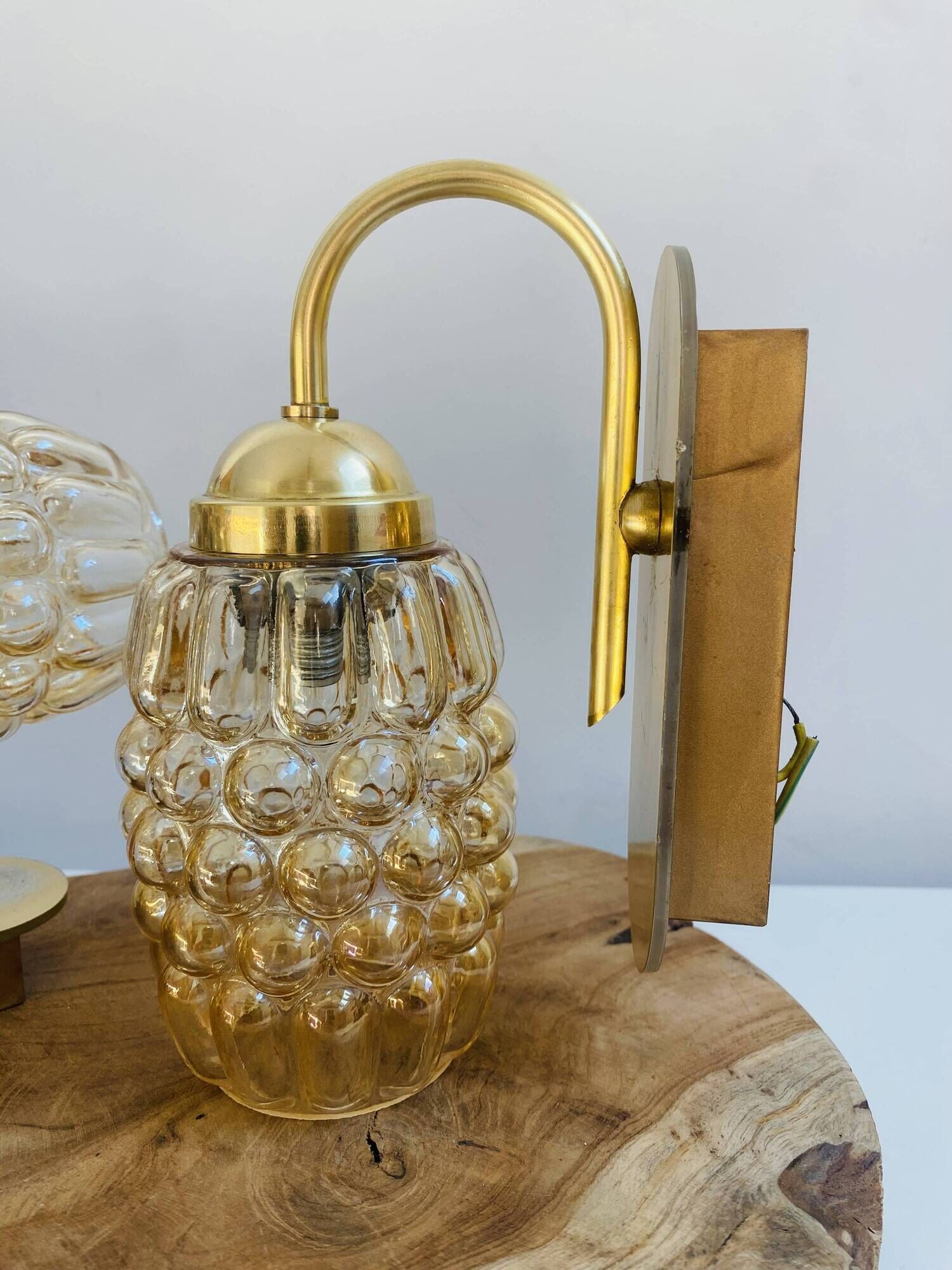 Pair of wall lights in brass and moulded bubble glass, style Helena Tynell.