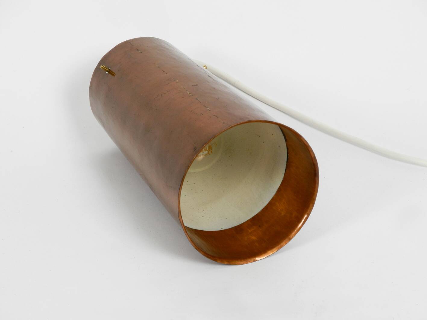 Beautiful Mid Century Modern pendant lamp made of copper shaped like a cone